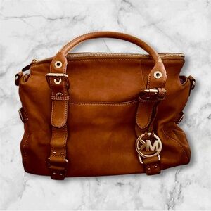 Michael Kors Satchel with Gold logo hang tag and MK dust bag. Good condition.